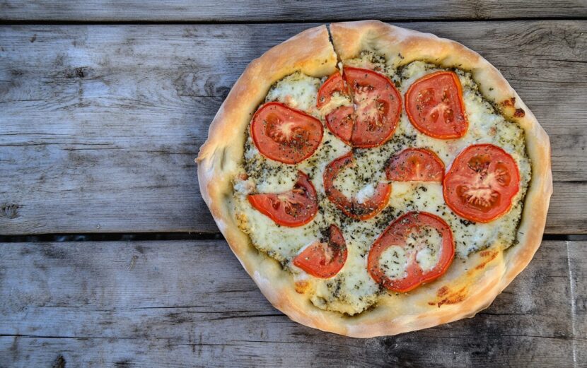 East Village Pizza: A Slice of New York Boldness Double Layered Tomato Pizza_done